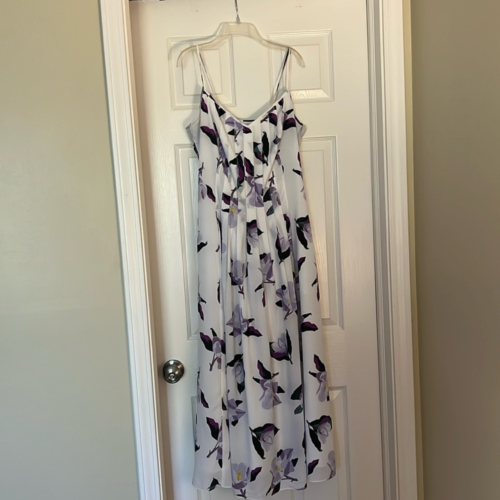 Banana Republic. White dress with purple flowers. Has pockets